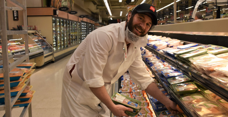 union member smiling because of raises